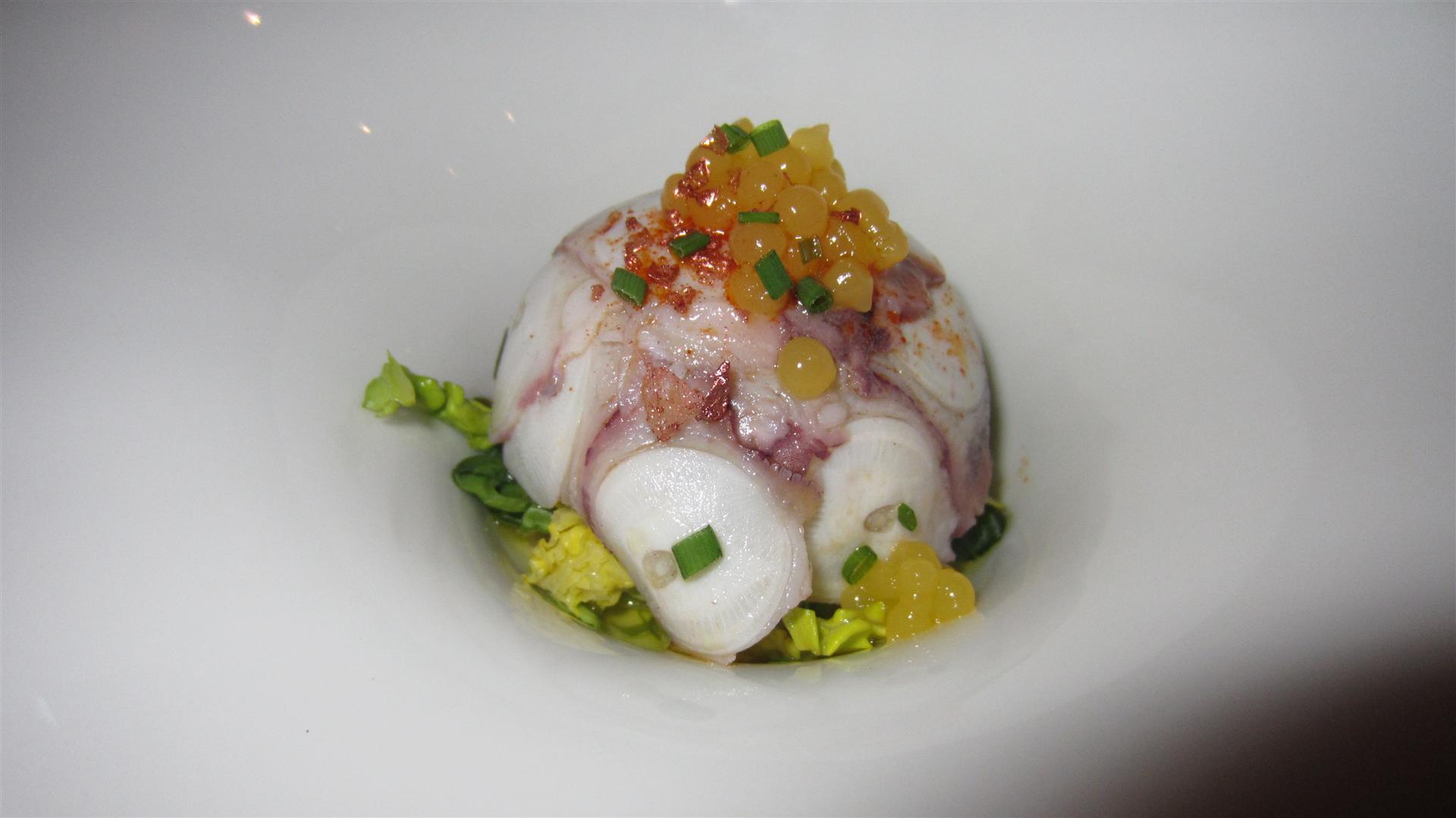 La Salita Squid covering langoustines. Caviar made of orange